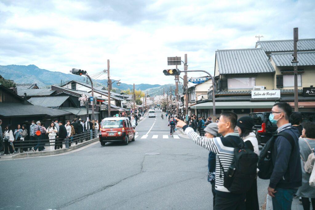 Everyday street scene in a Japanese shopping district, representing relational networks where the gospel can naturally spread through daily life